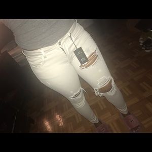 Tan Distressed American Eagle Jeans